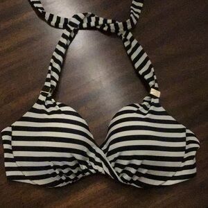 New without tag VS black & white bathing suit top gold accent pieces. Size 32D